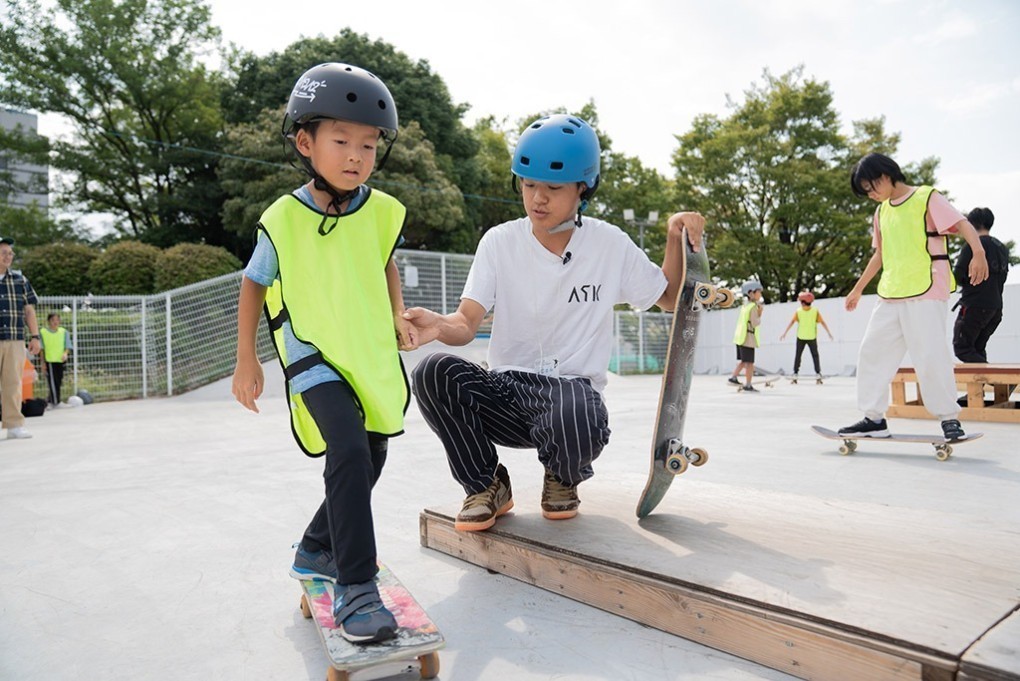 写真、子どもと吉金さん